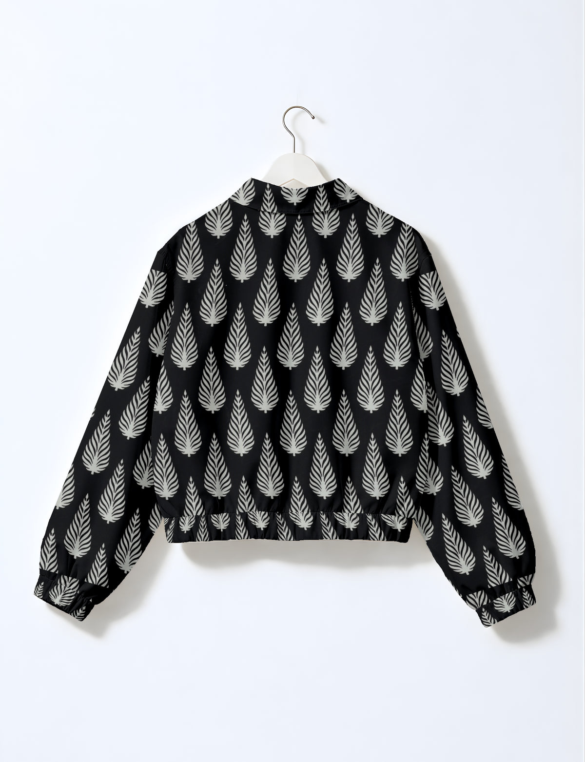 Upcycled Bomber Jacket made from recycled sari materials, featuring a cute cropped shape, elasticated hem and cuffs, and contrast sari print lining. Sustainable apparel promoting eco-friendly fashion and ethical clothing.