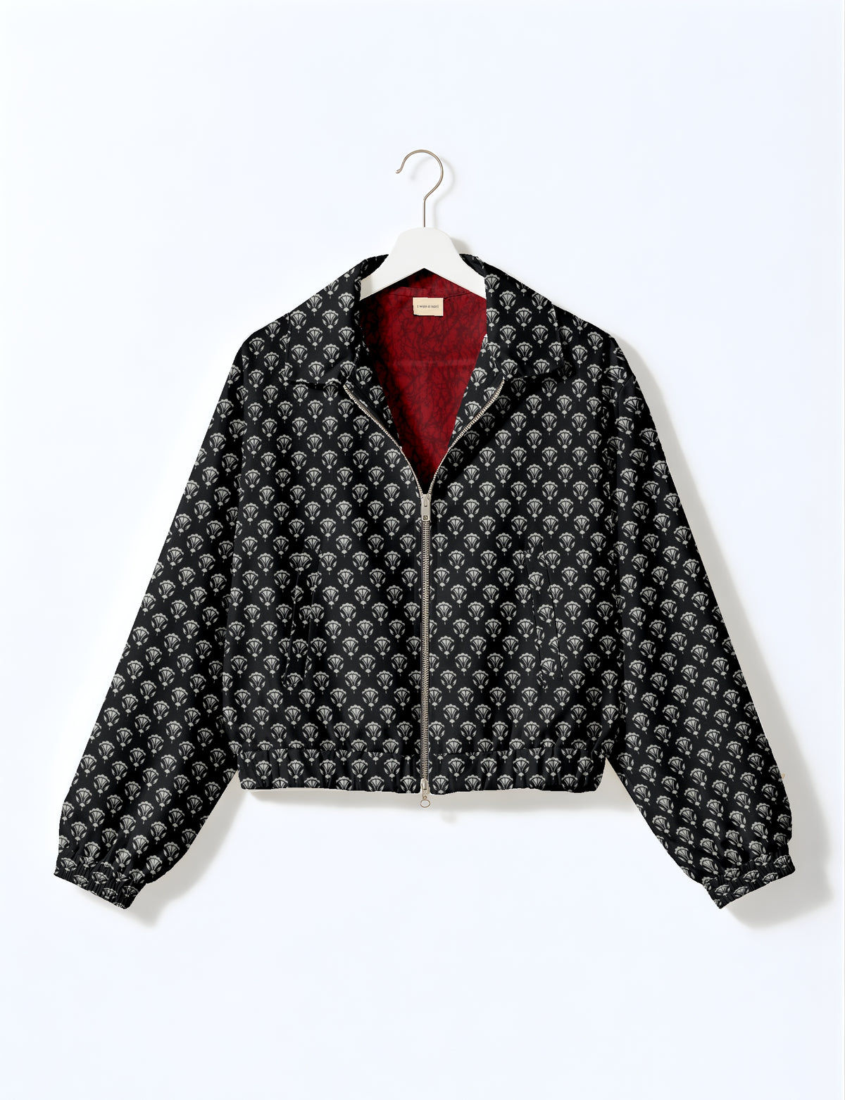 Upcycled Bomber Jacket made from recycled sari materials, featuring a cute cropped shape, elasticated hem and cuffs, and contrast sari print lining. Sustainable apparel promoting eco-friendly fashion and ethical clothing.