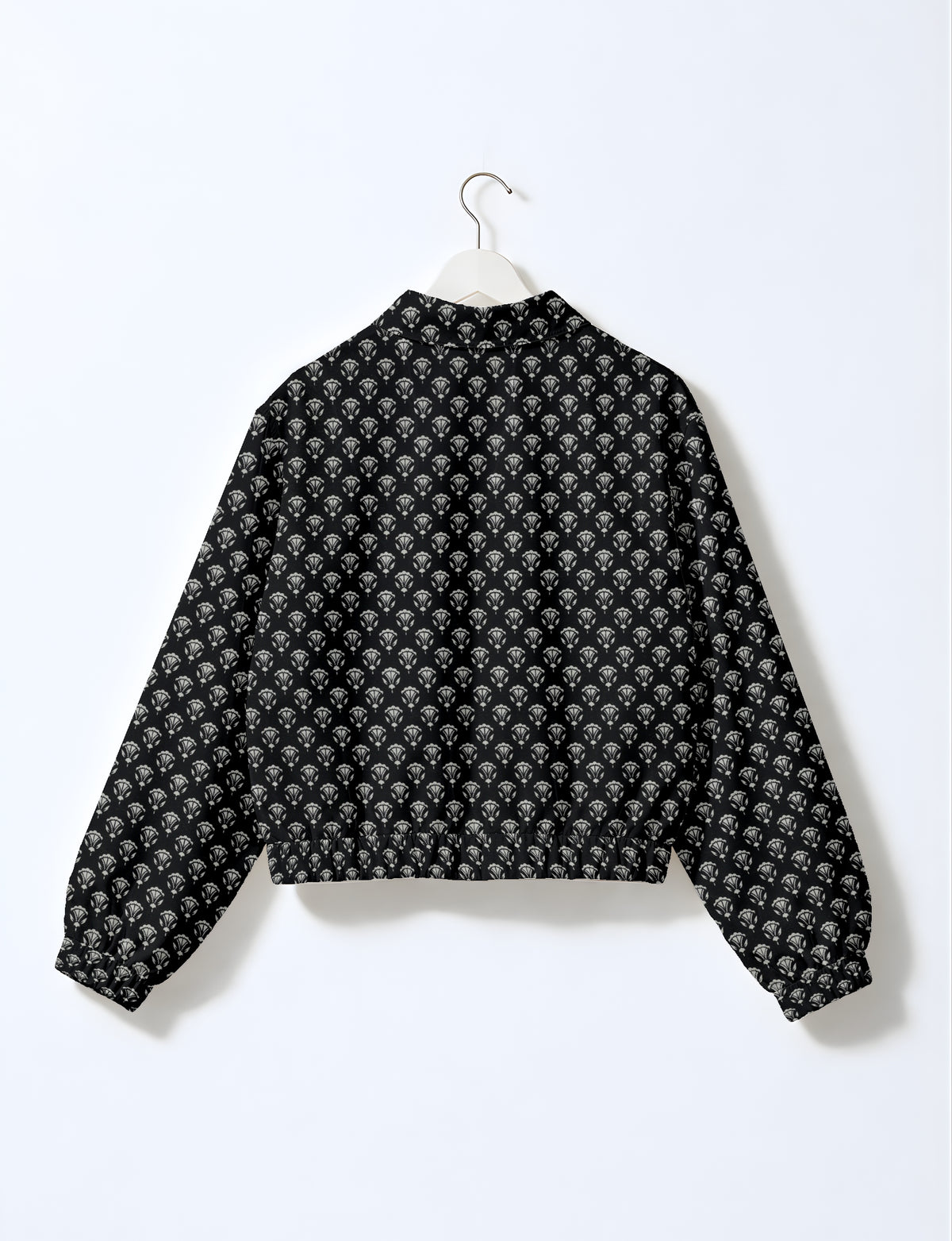 Upcycled Bomber Jacket made from recycled sari materials, featuring a cute cropped shape, elasticated hem and cuffs, and contrast sari print lining. Sustainable apparel promoting eco-friendly fashion and ethical clothing.