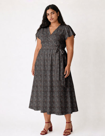 Elegant midi wrap dress with a V-neckline, adjustable waist tie, fitted bodice, and flared skirt for a timeless, flattering silhouette.