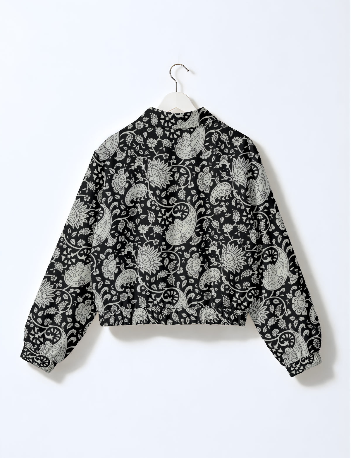Upcycled Bomber Jacket made from recycled sari materials, featuring a cute cropped shape, elasticated hem and cuffs, and contrast sari print lining. Sustainable apparel promoting eco-friendly fashion and ethical clothing.