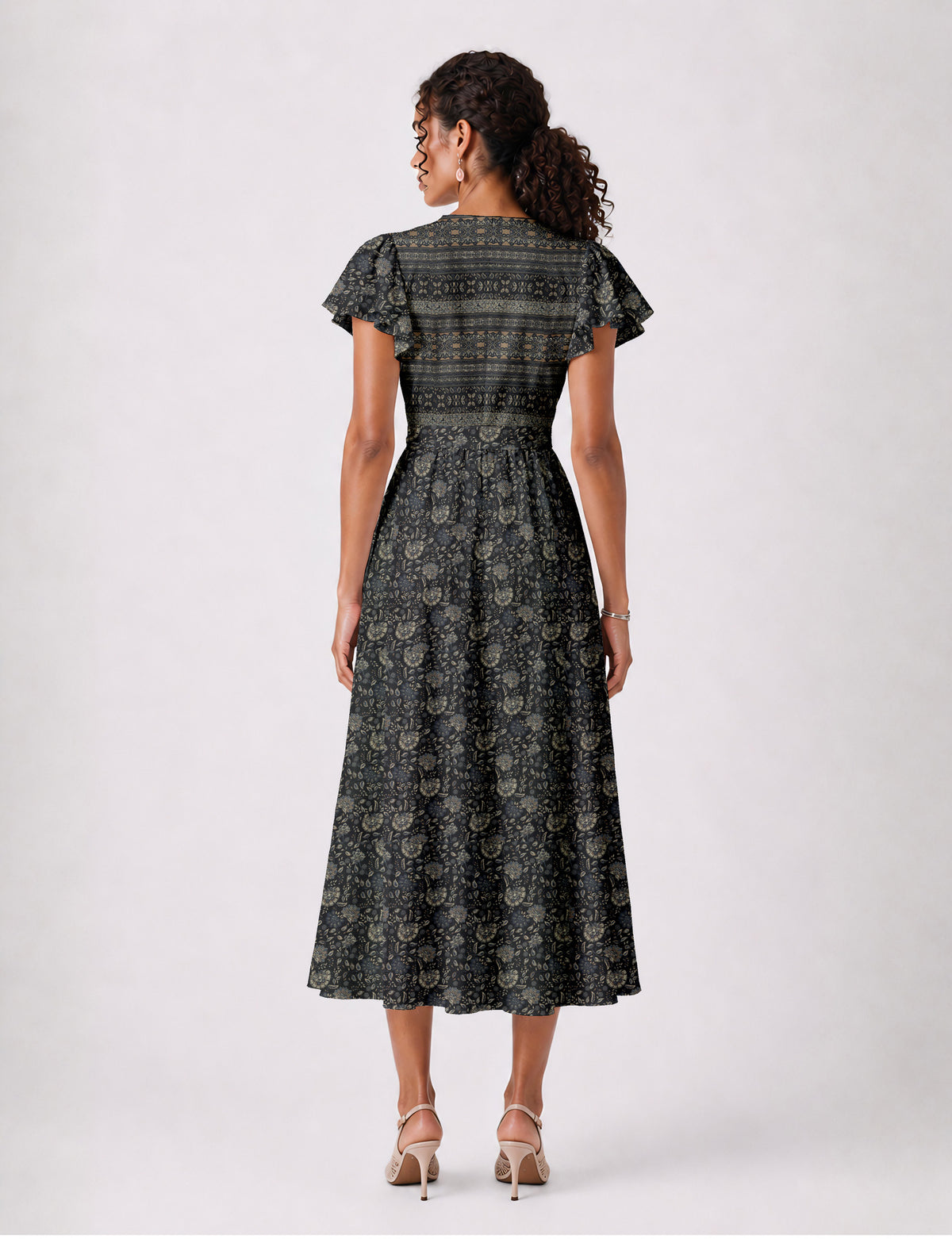 Elegant midi wrap dress with a V-neckline, adjustable waist tie, fitted bodice, and flared skirt for a timeless, flattering silhouette.