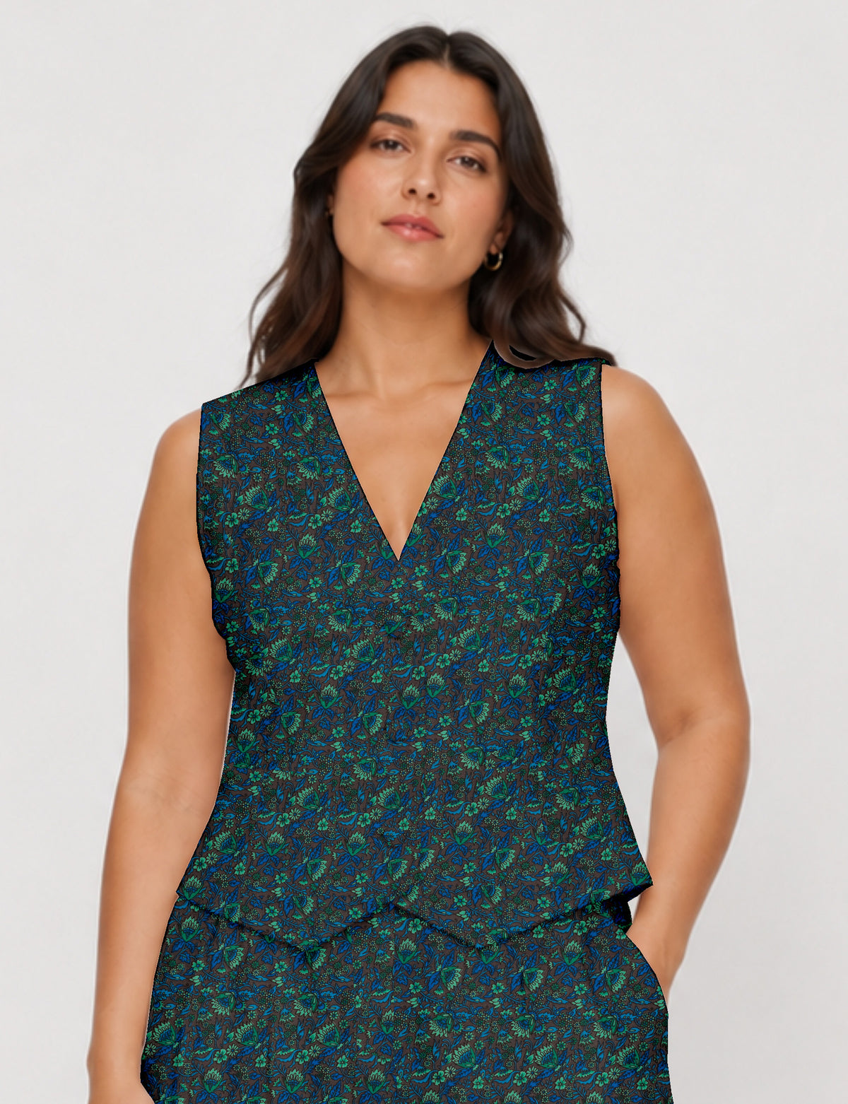 Women's fitted waistcoat with V-neck, single-breasted button closure, tailored silhouette, and pointed hem in sustainable fashion.