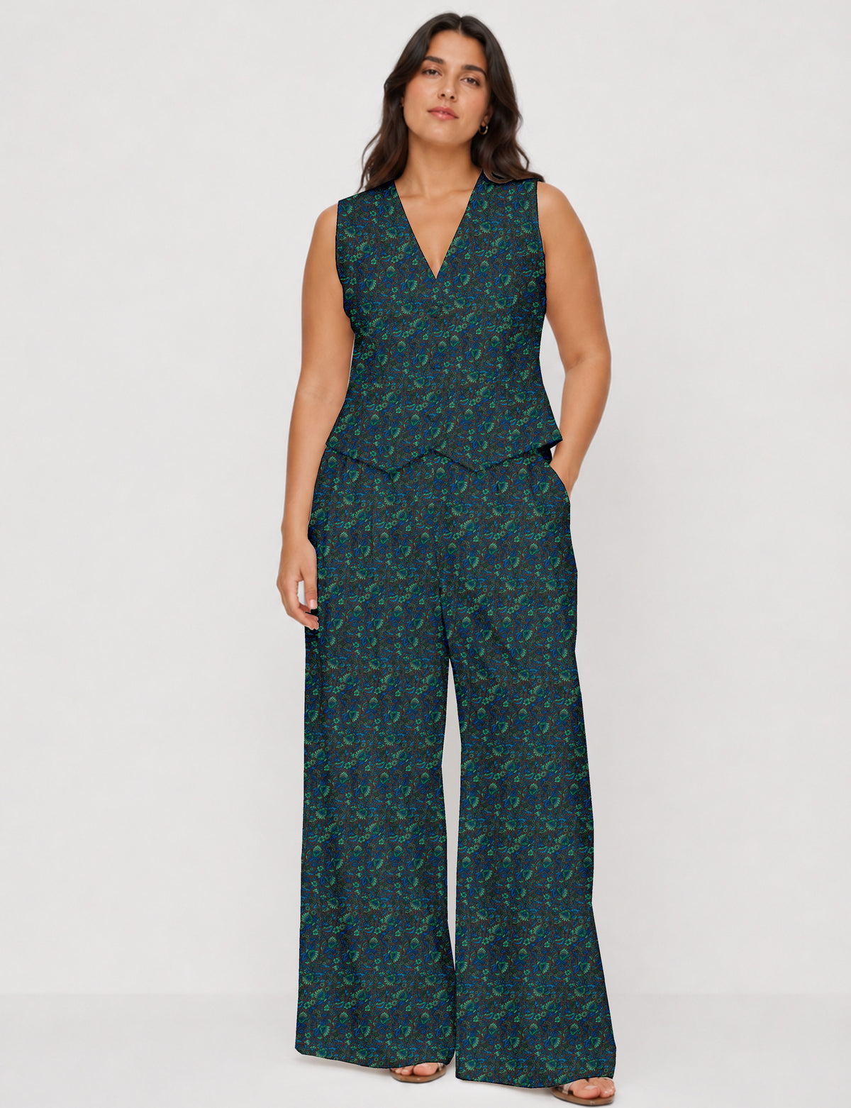 Women's tailored waistcoat set with a sleeveless V-neck button-front waistcoat and high-rise wide leg trousers in a coordinated matching outfit.