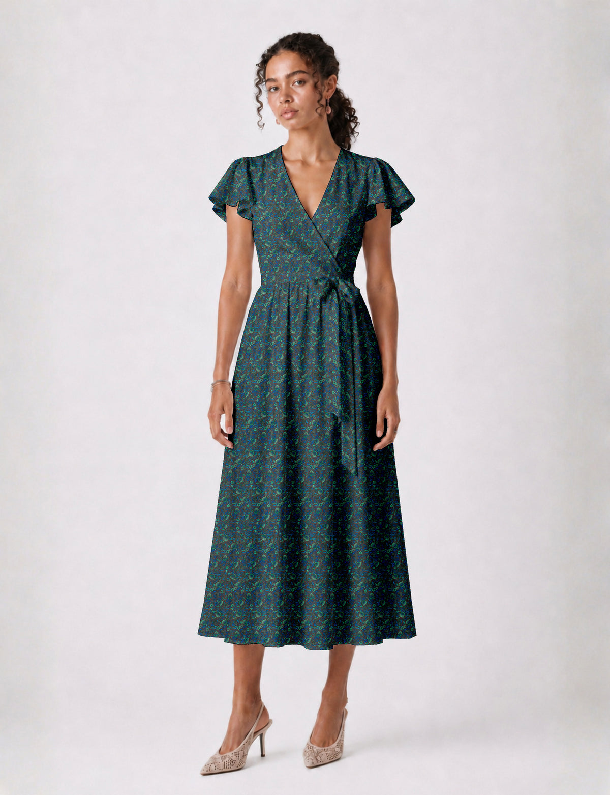 Elegant midi wrap dress with a V-neckline, adjustable waist tie, fitted bodice, and flared skirt for a timeless, flattering silhouette.