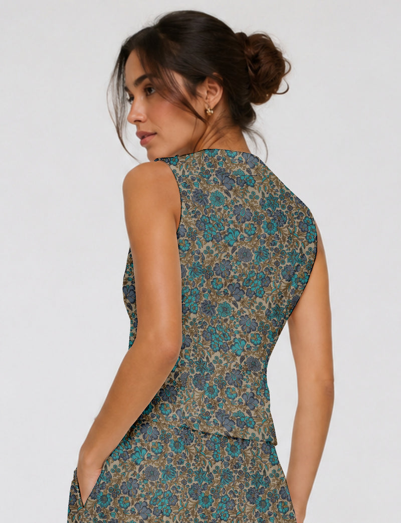 Women's fitted waistcoat with V-neck, single-breasted button closure, tailored silhouette, and pointed hem in sustainable fashion.