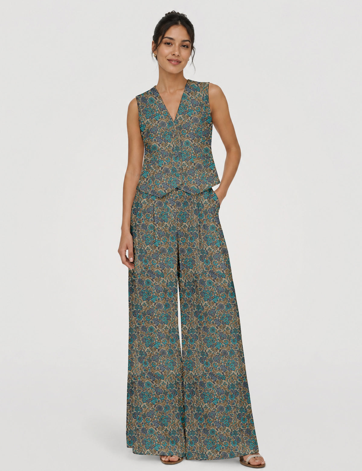 Women's tailored waistcoat set with a sleeveless V-neck button-front waistcoat and high-rise wide leg trousers in a coordinated matching outfit.