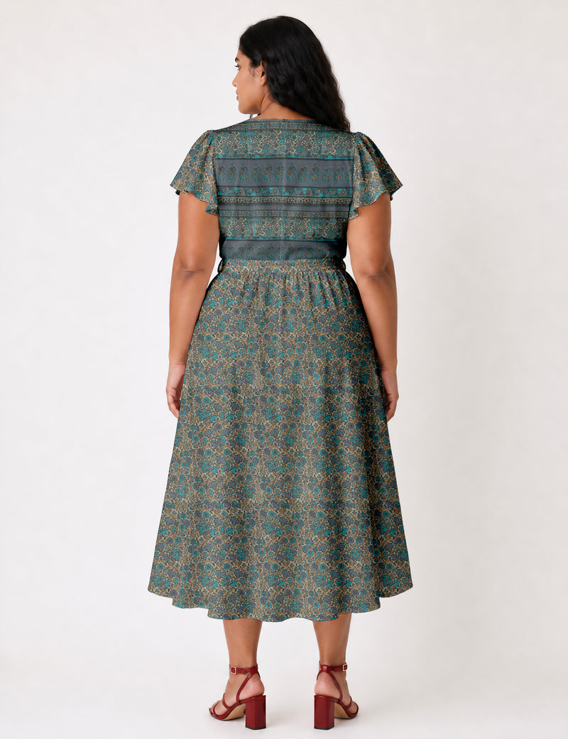 Elegant midi wrap dress with a V-neckline, adjustable waist tie, fitted bodice, and flared skirt for a timeless, flattering silhouette.