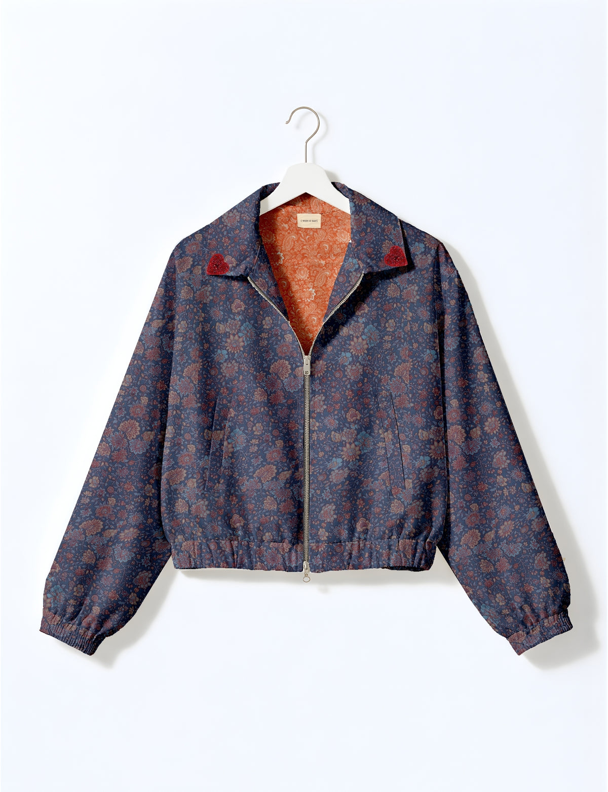 Love Bomber Jacket made from recycled fabric, featuring hand-stitched Aari embroidery. A unique piece of zero-waste clothing, part of the circular fashion movement. Designed with upcycled materials for a stylish yet environmentally friendly clothing choice.