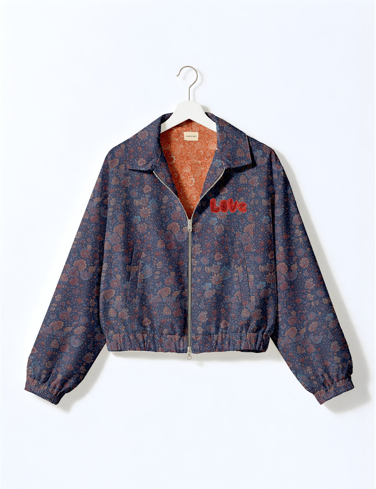 Love Bomber Jacket made from recycled fabric, featuring hand-stitched Aari embroidery. A unique piece of zero-waste clothing, part of the circular fashion movement. Designed with upcycled materials for a stylish yet environmentally friendly clothing choice.