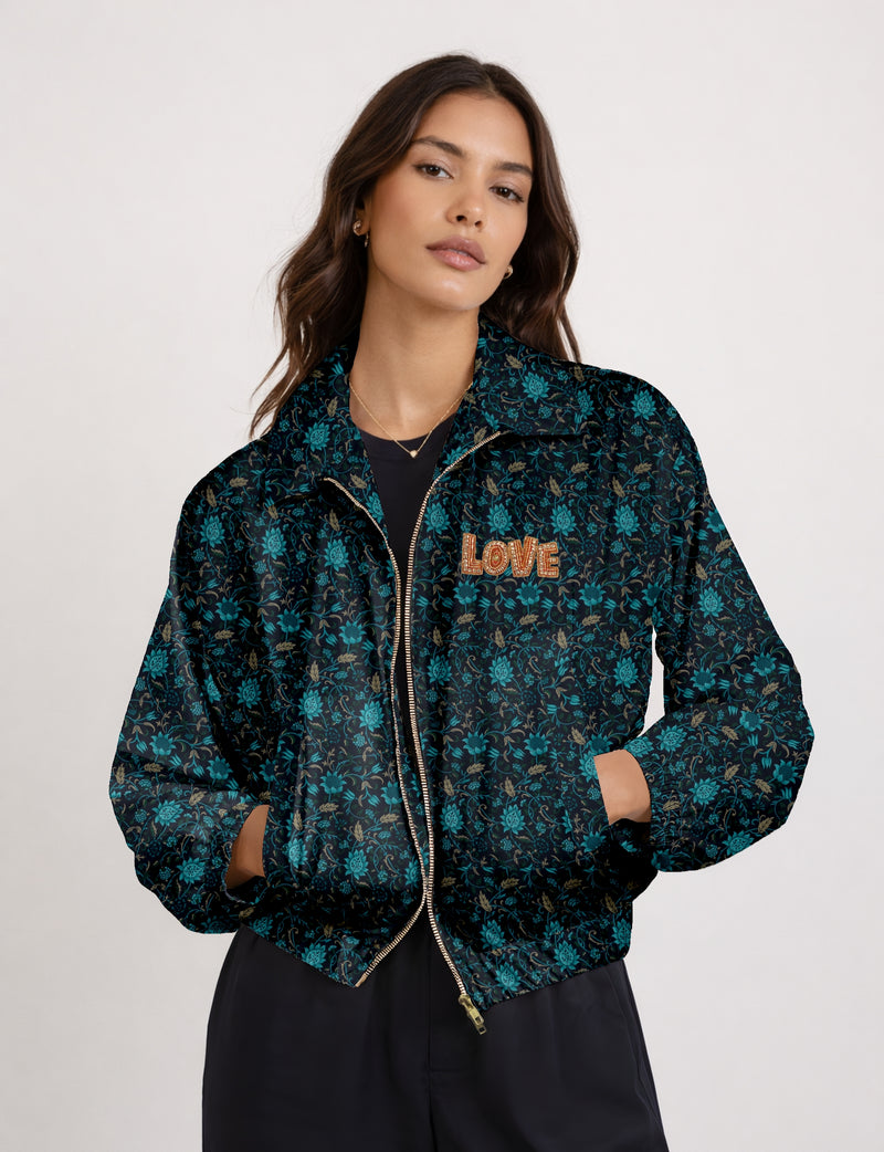 Love Bomber Jacket made from recycled fabric, featuring hand-stitched Aari embroidery. A unique piece of zero-waste clothing, part of the circular fashion movement. Designed with upcycled materials for a stylish yet environmentally friendly clothing choice.