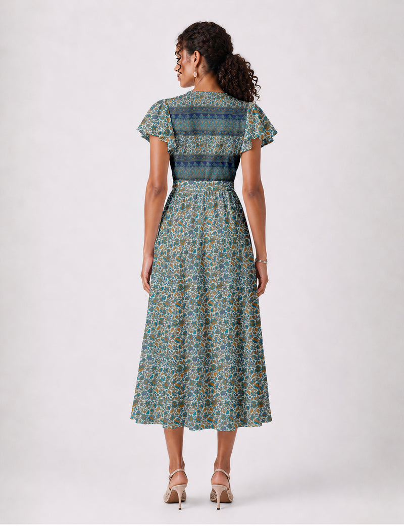 Elegant midi wrap dress with a V-neckline, adjustable waist tie, fitted bodice, and flared skirt for a timeless, flattering silhouette.