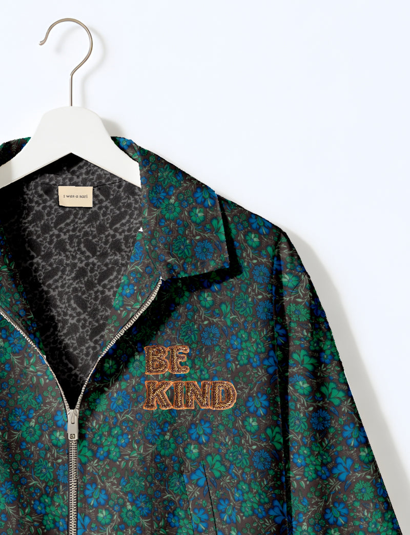 BE KIND Bomber jacket made from upcycled sari fabric with handcrafted Aari embroidery by female artisans.