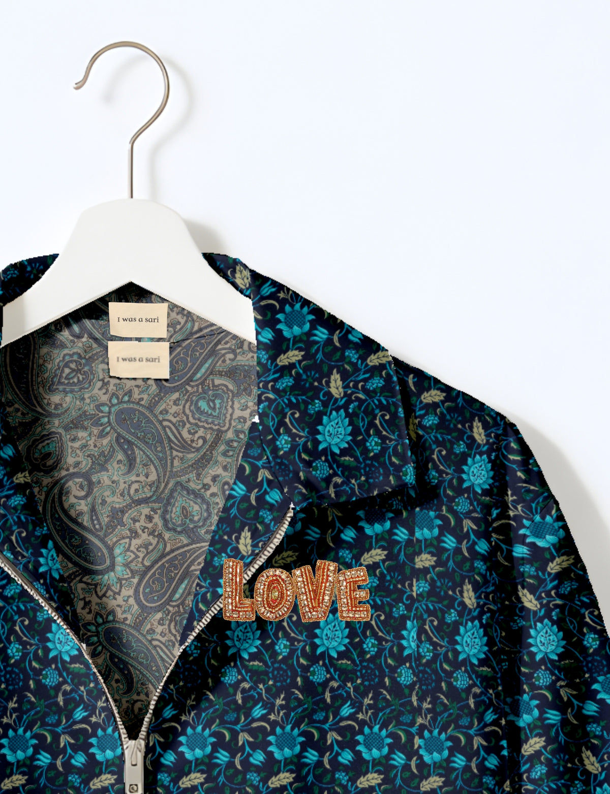 Love Bomber Jacket made from recycled fabric, featuring hand-stitched Aari embroidery. A unique piece of zero-waste clothing, part of the circular fashion movement. Designed with upcycled materials for a stylish yet environmentally friendly clothing choice.