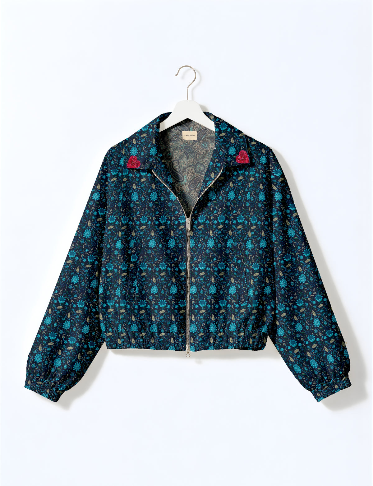 Love Bomber Jacket made from recycled fabric, featuring hand-stitched Aari embroidery. A unique piece of zero-waste clothing, part of the circular fashion movement. Designed with upcycled materials for a stylish yet environmentally friendly clothing choice.