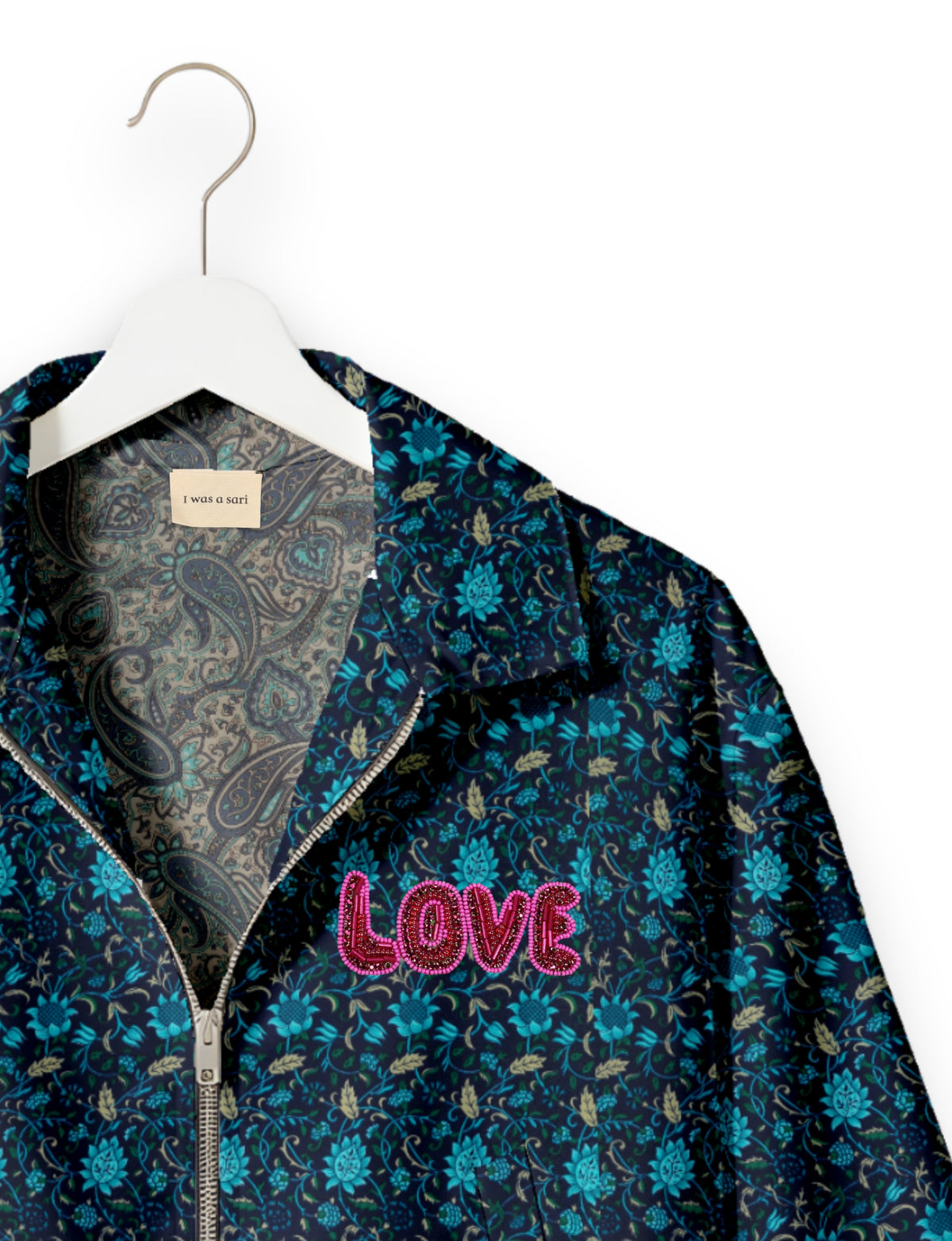 Love Bomber Jacket made from recycled fabric, featuring hand-stitched Aari embroidery. A unique piece of zero-waste clothing, part of the circular fashion movement. Designed with upcycled materials for a stylish yet environmentally friendly clothing choice.