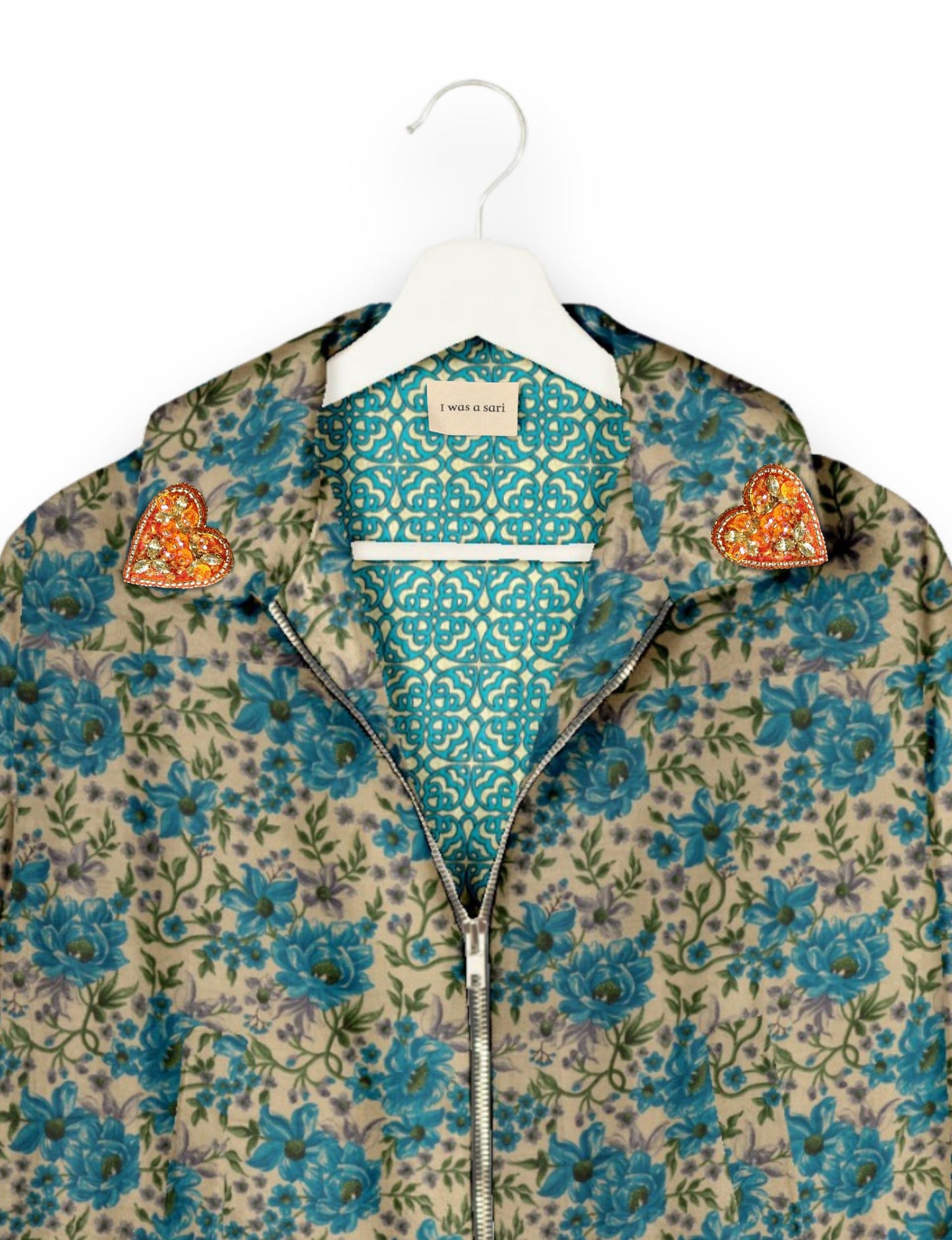 Make a bold statement with our Heart Drop Earrings, a symbol of conscious luxury and ethical fashion. Handcrafted using the intricate Aari embroidery technique, these earrings are made from upcycled sari fabric, embracing slow fashion and zero waste clothing. Elevate your look with sustainable apparel that supports fair trade fashion while reducing textile waste. Choose eco-friendly fashion that speaks of love, artistry, and responsibility.