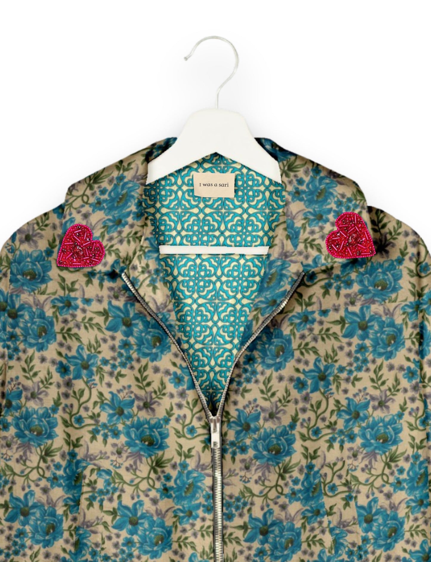 Make a bold statement with our Heart Drop Earrings, a symbol of conscious luxury and ethical fashion. Handcrafted using the intricate Aari embroidery technique, these earrings are made from upcycled sari fabric, embracing slow fashion and zero waste clothing. Elevate your look with sustainable apparel that supports fair trade fashion while reducing textile waste. Choose eco-friendly fashion that speaks of love, artistry, and responsibility.