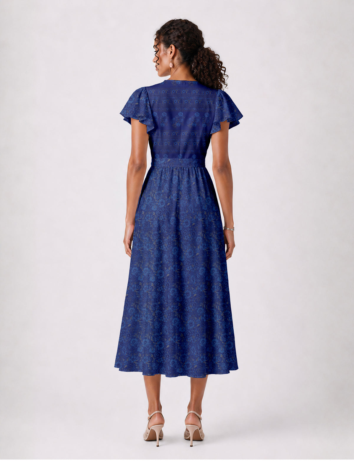 Elegant midi wrap dress with a V-neckline, adjustable waist tie, fitted bodice, and flared skirt for a timeless, flattering silhouette.
