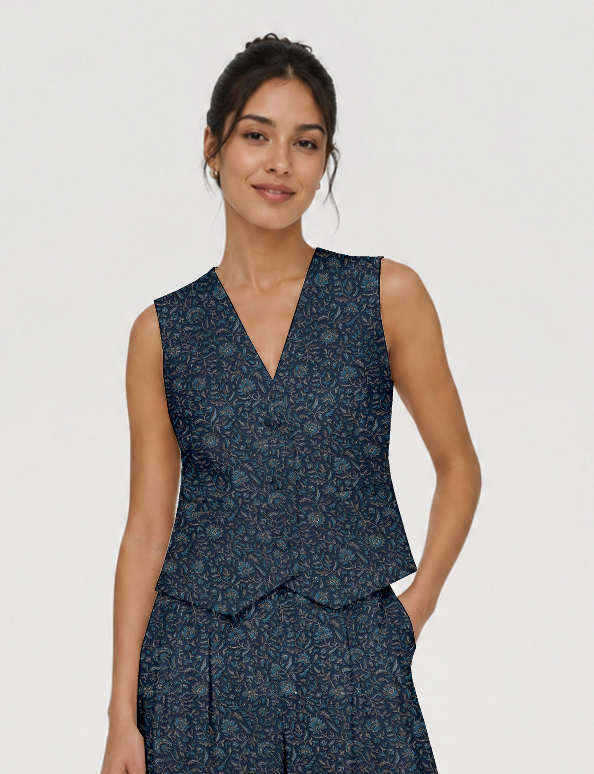 Women's fitted waistcoat with V-neck, single-breasted button closure, tailored silhouette, and pointed hem in sustainable fashion.
