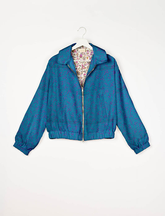 Upcycled Bomber Jacket made from recycled sari materials, featuring a cute cropped shape, elasticated hem and cuffs, and contrast sari print lining. Sustainable apparel promoting eco-friendly fashion and ethical clothing.