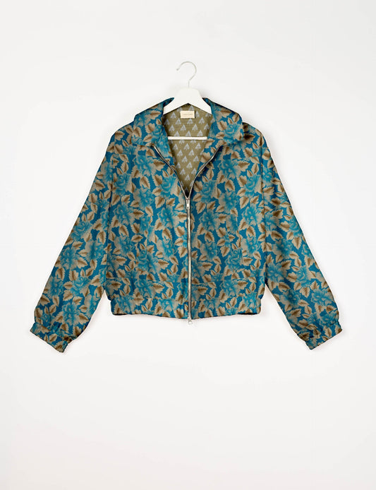 Upcycled Bomber Jacket made from recycled sari materials, featuring a cute cropped shape, elasticated hem and cuffs, and contrast sari print lining. Sustainable apparel promoting eco-friendly fashion and ethical clothing.