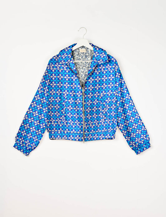 Upcycled Bomber Jacket made from recycled sari materials, featuring a cute cropped shape, elasticated hem and cuffs, and contrast sari print lining. Sustainable apparel promoting eco-friendly fashion and ethical clothing.
