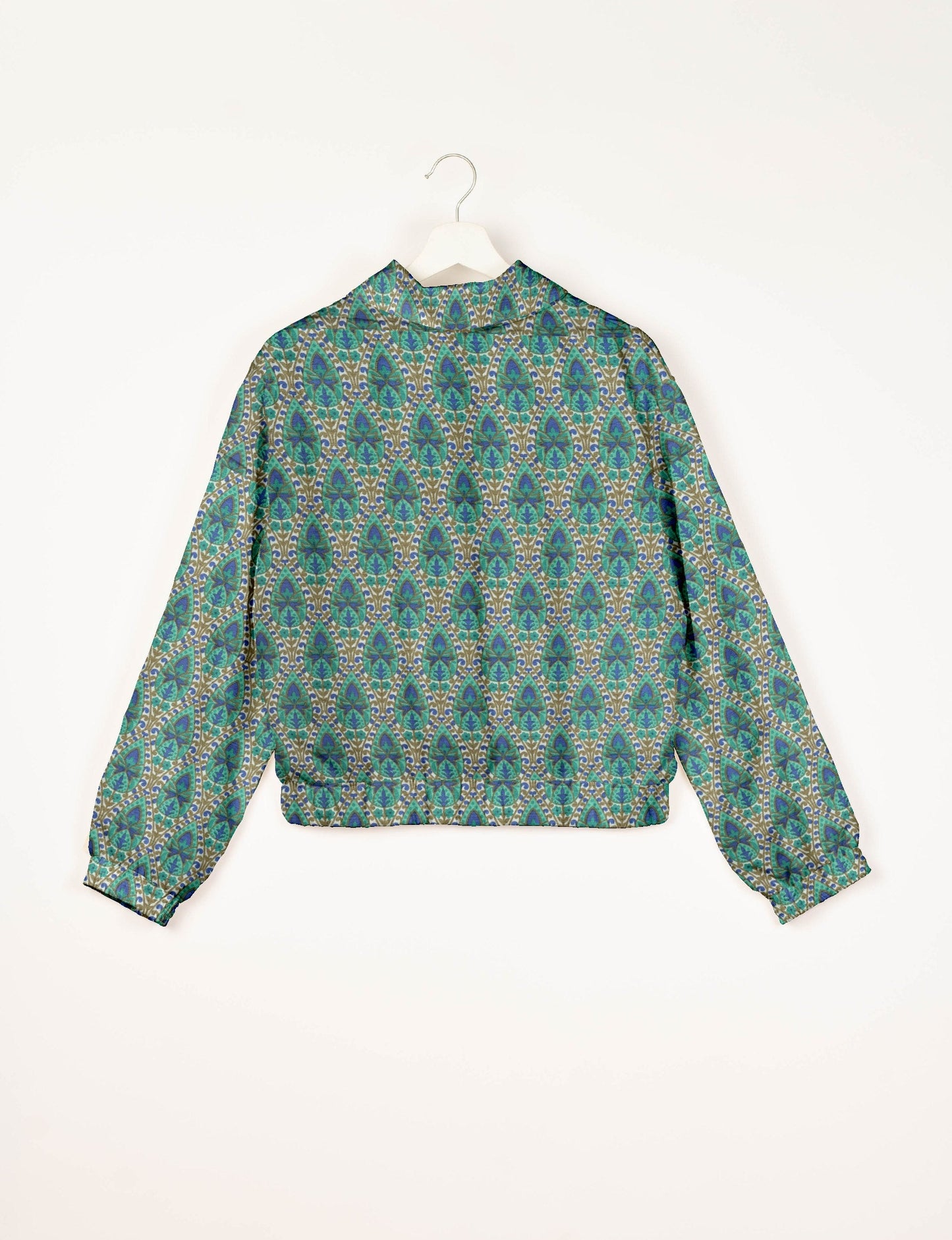 Upcycled Bomber Jacket made from recycled sari materials, featuring a cute cropped shape, elasticated hem and cuffs, and contrast sari print lining. Sustainable apparel promoting eco-friendly fashion and ethical clothing.