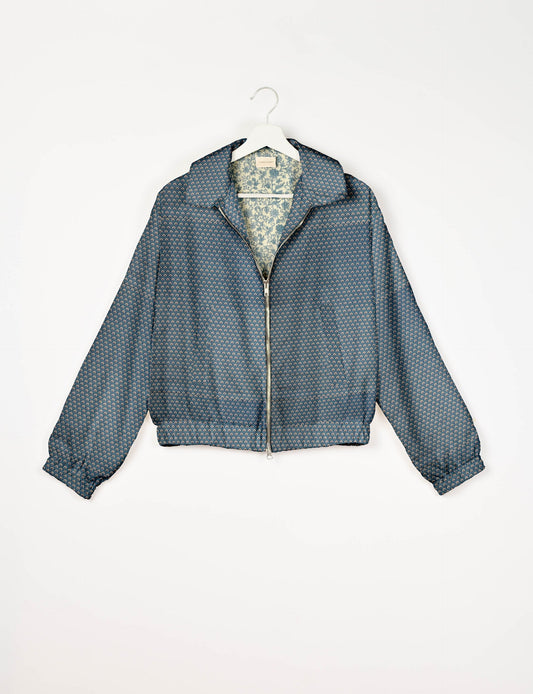 Upcycled Bomber Jacket made from recycled sari materials, featuring a cute cropped shape, elasticated hem and cuffs, and contrast sari print lining. Sustainable apparel promoting eco-friendly fashion and ethical clothing.