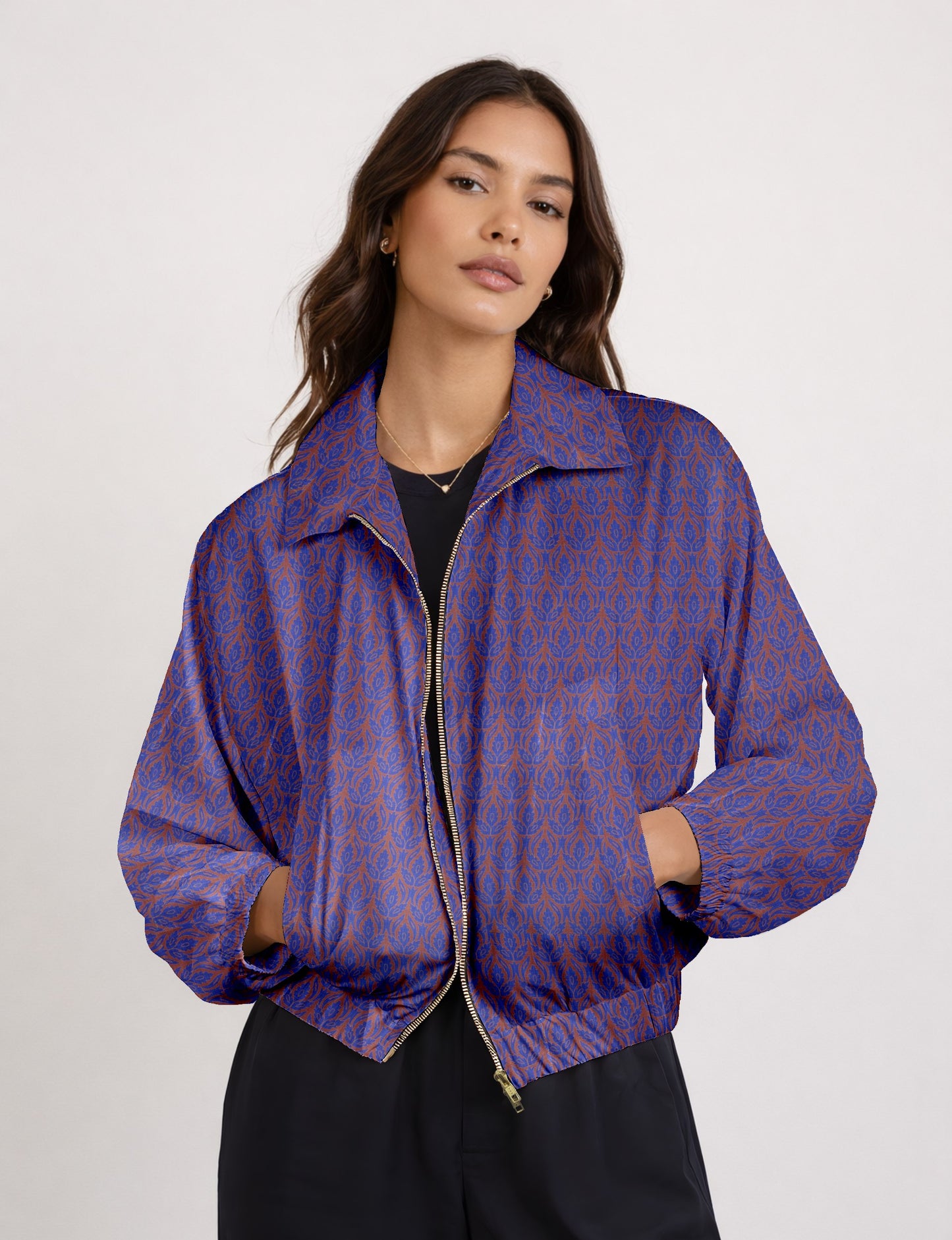 Upcycled Bomber Jacket made from recycled sari materials, featuring a cute cropped shape, elasticated hem and cuffs, and contrast sari print lining. Sustainable apparel promoting eco-friendly fashion and ethical clothing.