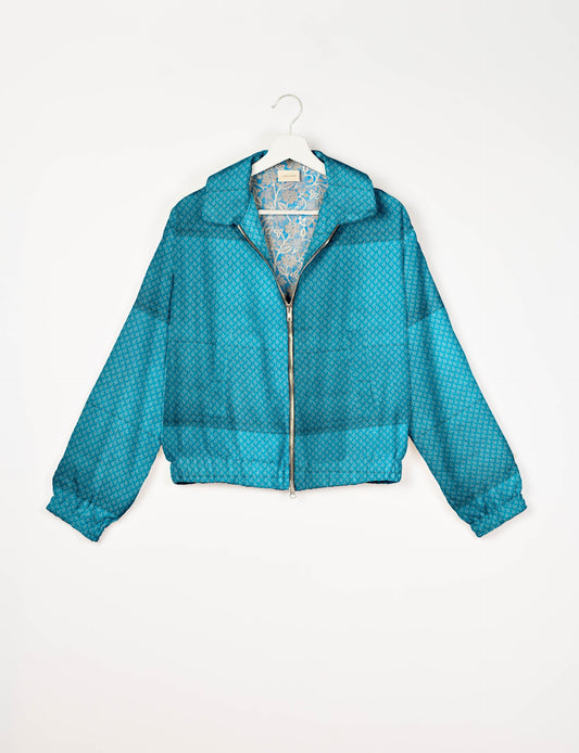 Upcycled Bomber Jacket made from recycled sari materials, featuring a cute cropped shape, elasticated hem and cuffs, and contrast sari print lining. Sustainable apparel promoting eco-friendly fashion and ethical clothing.