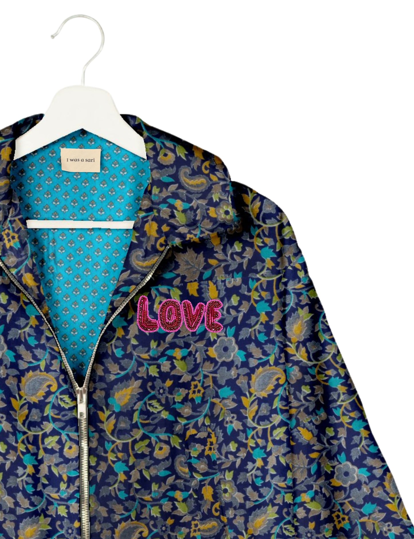 Love Bomber Jacket made from recycled fabric, featuring hand-stitched Aari embroidery. A unique piece of zero-waste clothing, part of the circular fashion movement. Designed with upcycled materials for a stylish yet environmentally friendly clothing choice.