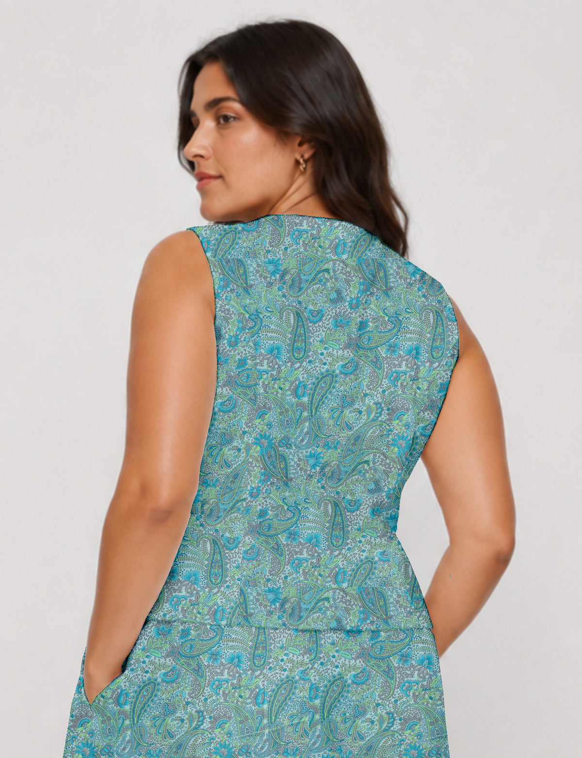 Women's fitted waistcoat with V-neck, single-breasted button closure, tailored silhouette, and pointed hem in sustainable fashion.