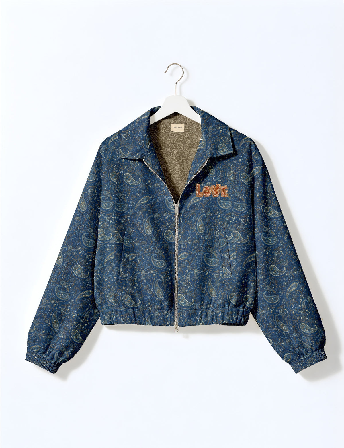 Love Bomber Jacket made from recycled fabric, featuring hand-stitched Aari embroidery. A unique piece of zero-waste clothing, part of the circular fashion movement. Designed with upcycled materials for a stylish yet environmentally friendly clothing choice.