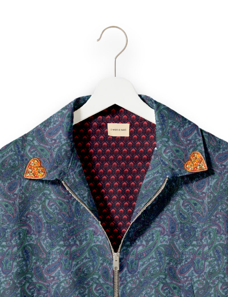 Love Bomber Jacket made from recycled fabric, featuring hand-stitched Aari embroidery. A unique piece of zero-waste clothing, part of the circular fashion movement. Designed with upcycled materials for a stylish yet environmentally friendly clothing choice.