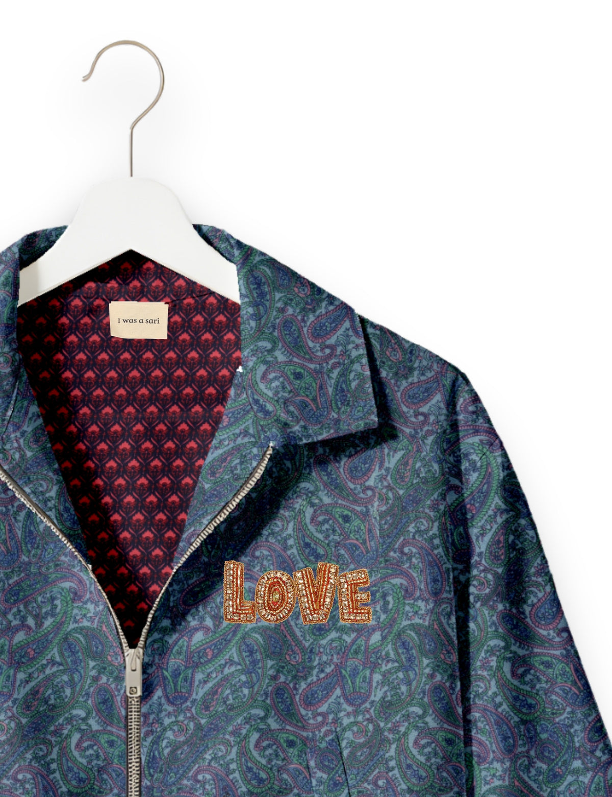 Love Bomber Jacket made from recycled fabric, featuring hand-stitched Aari embroidery. A unique piece of zero-waste clothing, part of the circular fashion movement. Designed with upcycled materials for a stylish yet environmentally friendly clothing choice.