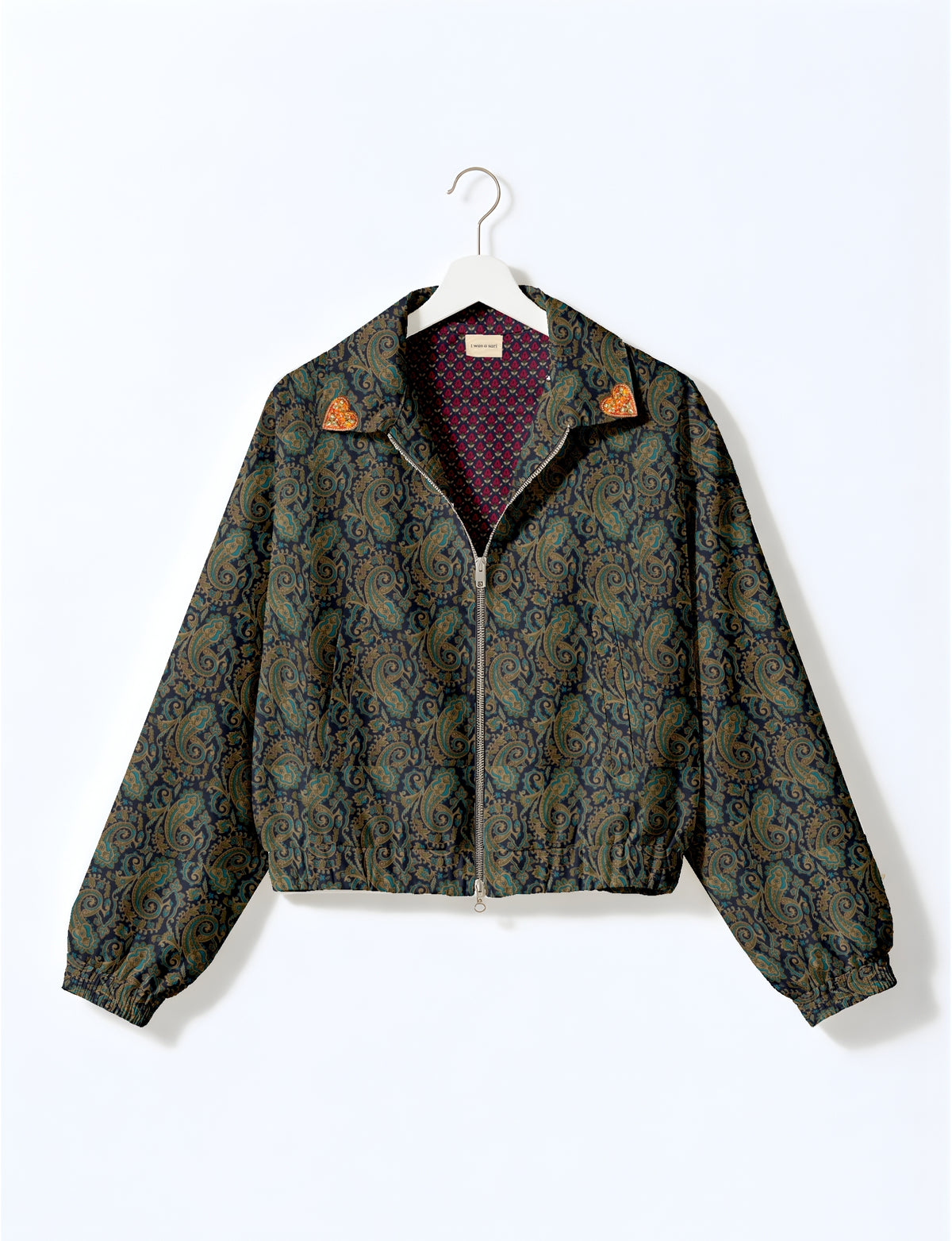 Love Bomber Jacket made from recycled fabric, featuring hand-stitched Aari embroidery. A unique piece of zero-waste clothing, part of the circular fashion movement. Designed with upcycled materials for a stylish yet environmentally friendly clothing choice.
