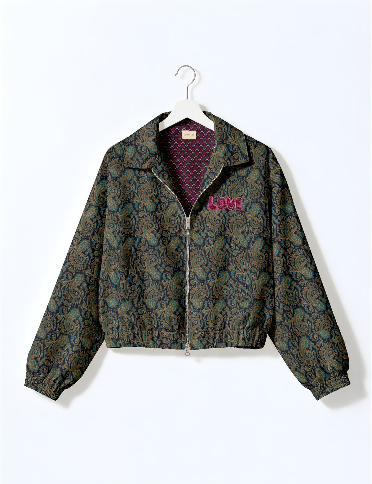 Love Bomber Jacket made from recycled fabric, featuring hand-stitched Aari embroidery. A unique piece of zero-waste clothing, part of the circular fashion movement. Designed with upcycled materials for a stylish yet environmentally friendly clothing choice.