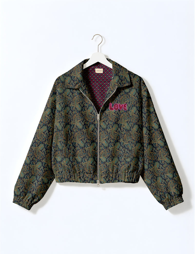Love Bomber Jacket made from recycled fabric, featuring hand-stitched Aari embroidery. A unique piece of zero-waste clothing, part of the circular fashion movement. Designed with upcycled materials for a stylish yet environmentally friendly clothing choice.