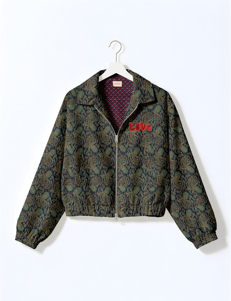 Love Bomber Jacket made from recycled fabric, featuring hand-stitched Aari embroidery. A unique piece of zero-waste clothing, part of the circular fashion movement. Designed with upcycled materials for a stylish yet environmentally friendly clothing choice.