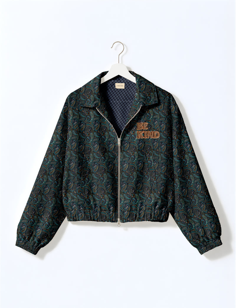 BE KIND Bomber jacket made from upcycled sari fabric with handcrafted Aari embroidery by female artisans.