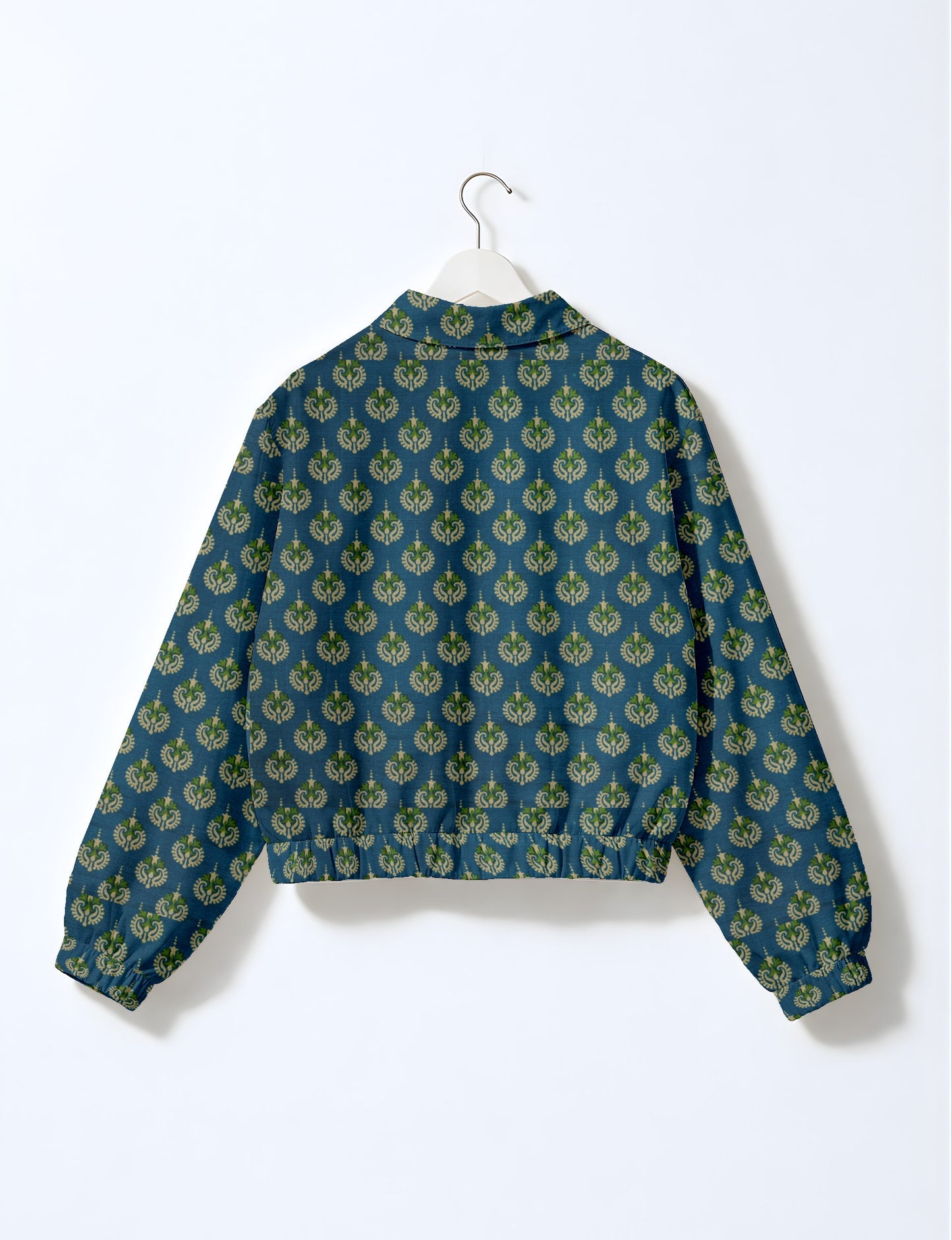 Upcycled Bomber Jacket made from recycled sari materials, featuring a cute cropped shape, elasticated hem and cuffs, and contrast sari print lining. Sustainable apparel promoting eco-friendly fashion and ethical clothing.