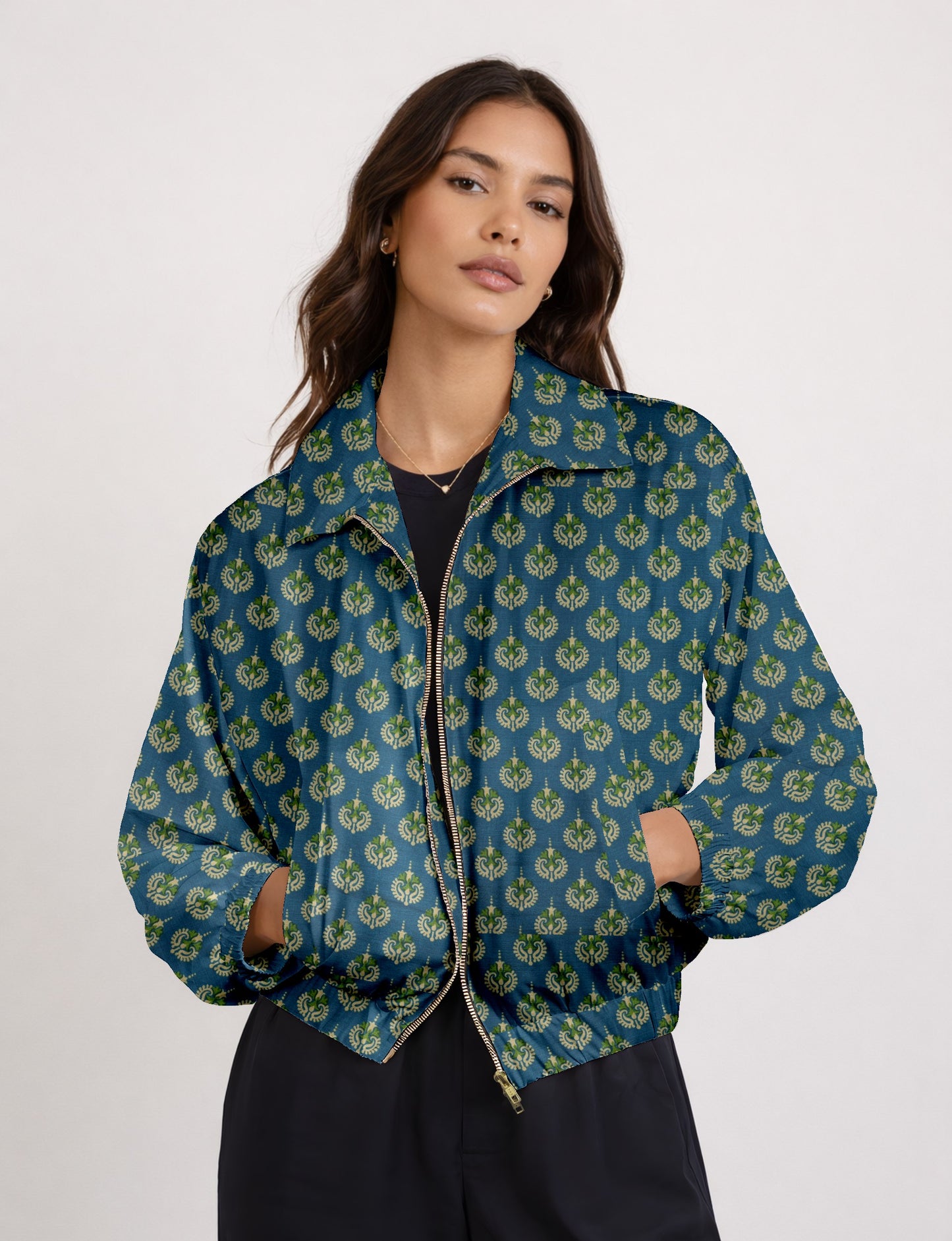 Upcycled Bomber Jacket made from recycled sari materials, featuring a cute cropped shape, elasticated hem and cuffs, and contrast sari print lining. Sustainable apparel promoting eco-friendly fashion and ethical clothing.