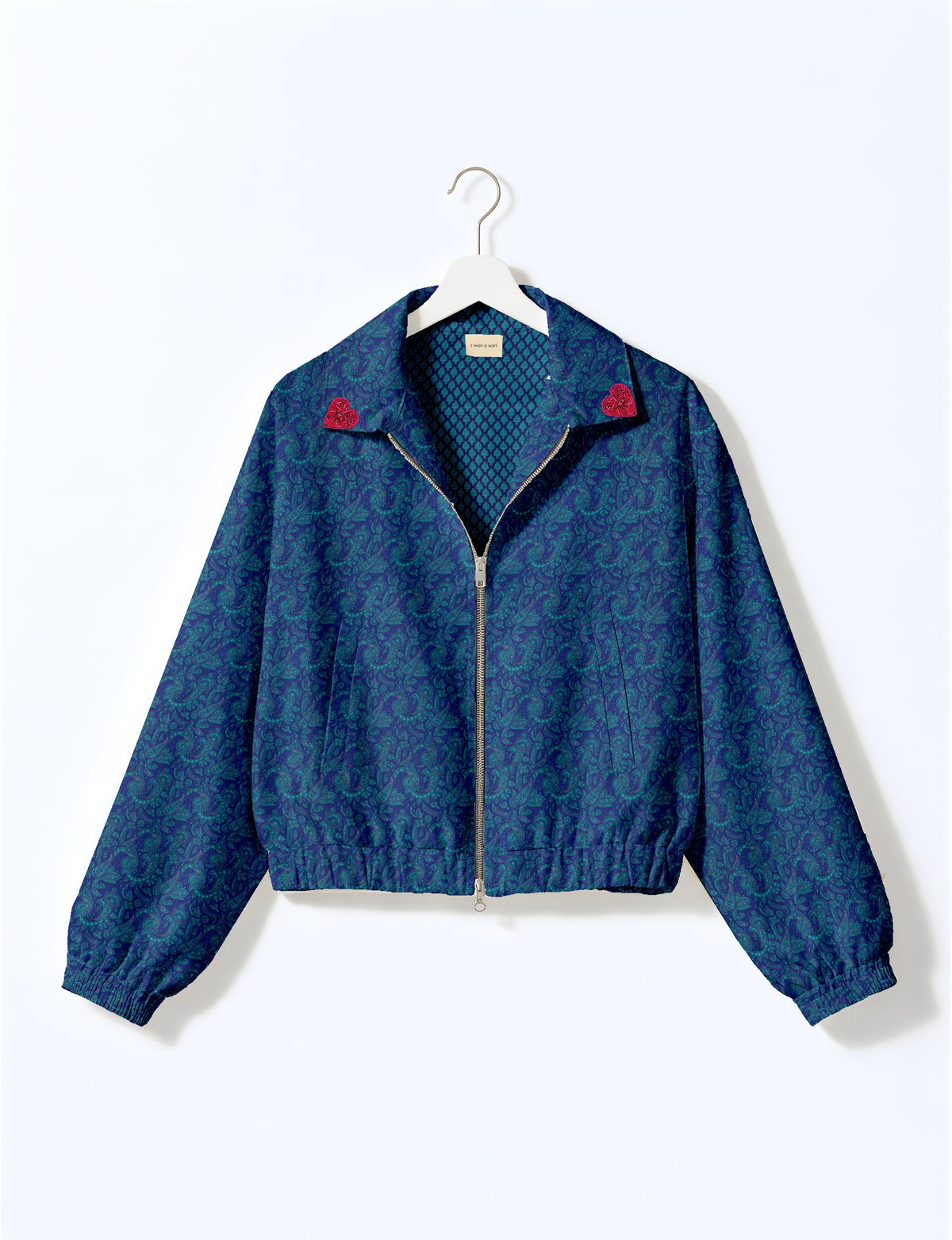 Love Bomber Jacket made from recycled fabric, featuring hand-stitched Aari embroidery. A unique piece of zero-waste clothing, part of the circular fashion movement. Designed with upcycled materials for a stylish yet environmentally friendly clothing choice.