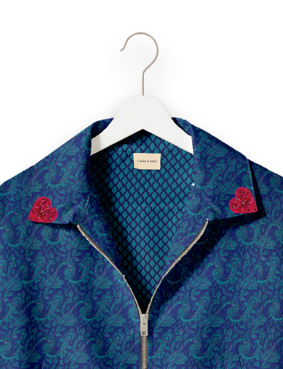 Love Bomber Jacket made from recycled fabric, featuring hand-stitched Aari embroidery. A unique piece of zero-waste clothing, part of the circular fashion movement. Designed with upcycled materials for a stylish yet environmentally friendly clothing choice.