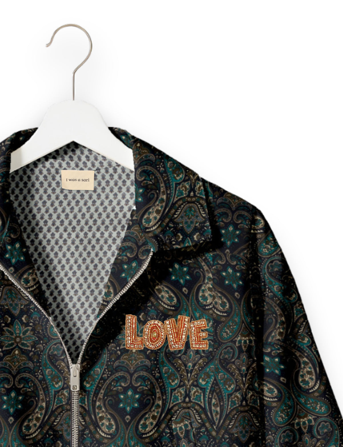 Love Bomber Jacket made from recycled fabric, featuring hand-stitched Aari embroidery. A unique piece of zero-waste clothing, part of the circular fashion movement. Designed with upcycled materials for a stylish yet environmentally friendly clothing choice.