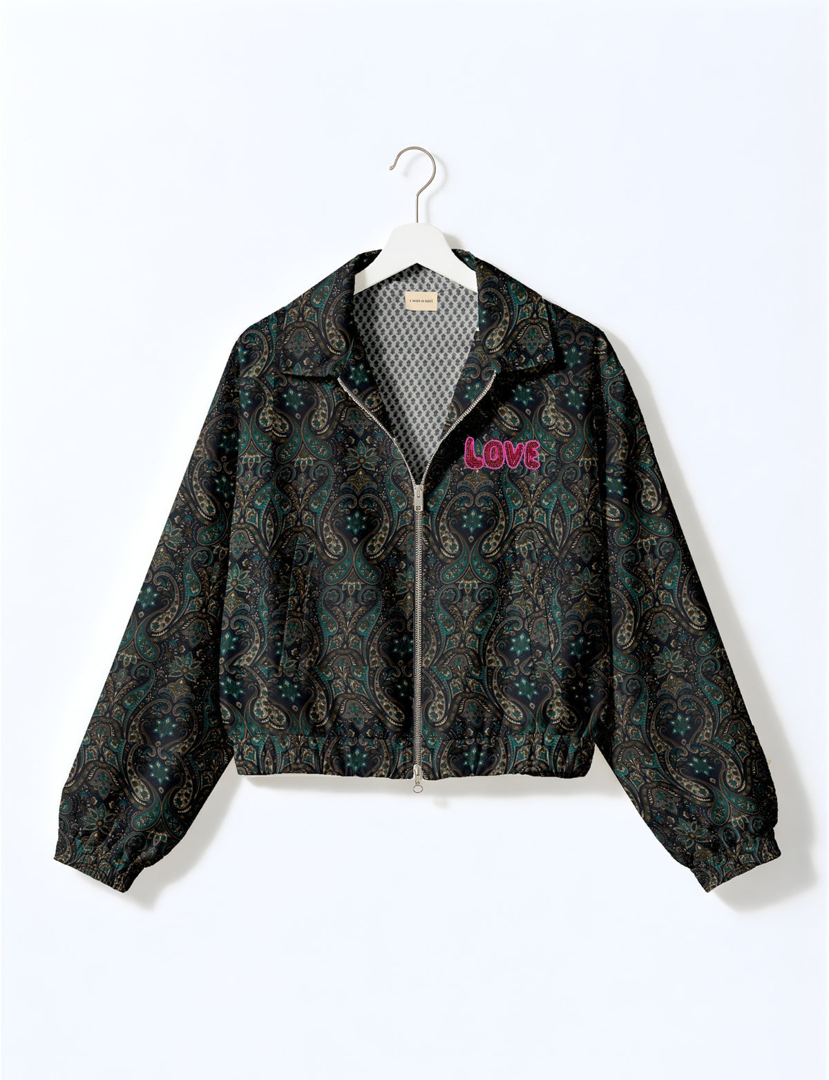 Love Bomber Jacket made from recycled fabric, featuring hand-stitched Aari embroidery. A unique piece of zero-waste clothing, part of the circular fashion movement. Designed with upcycled materials for a stylish yet environmentally friendly clothing choice.