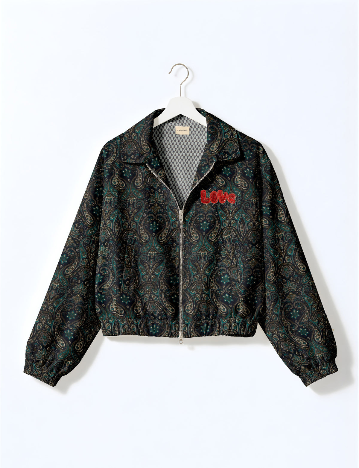 Love Bomber Jacket made from recycled fabric, featuring hand-stitched Aari embroidery. A unique piece of zero-waste clothing, part of the circular fashion movement. Designed with upcycled materials for a stylish yet environmentally friendly clothing choice.