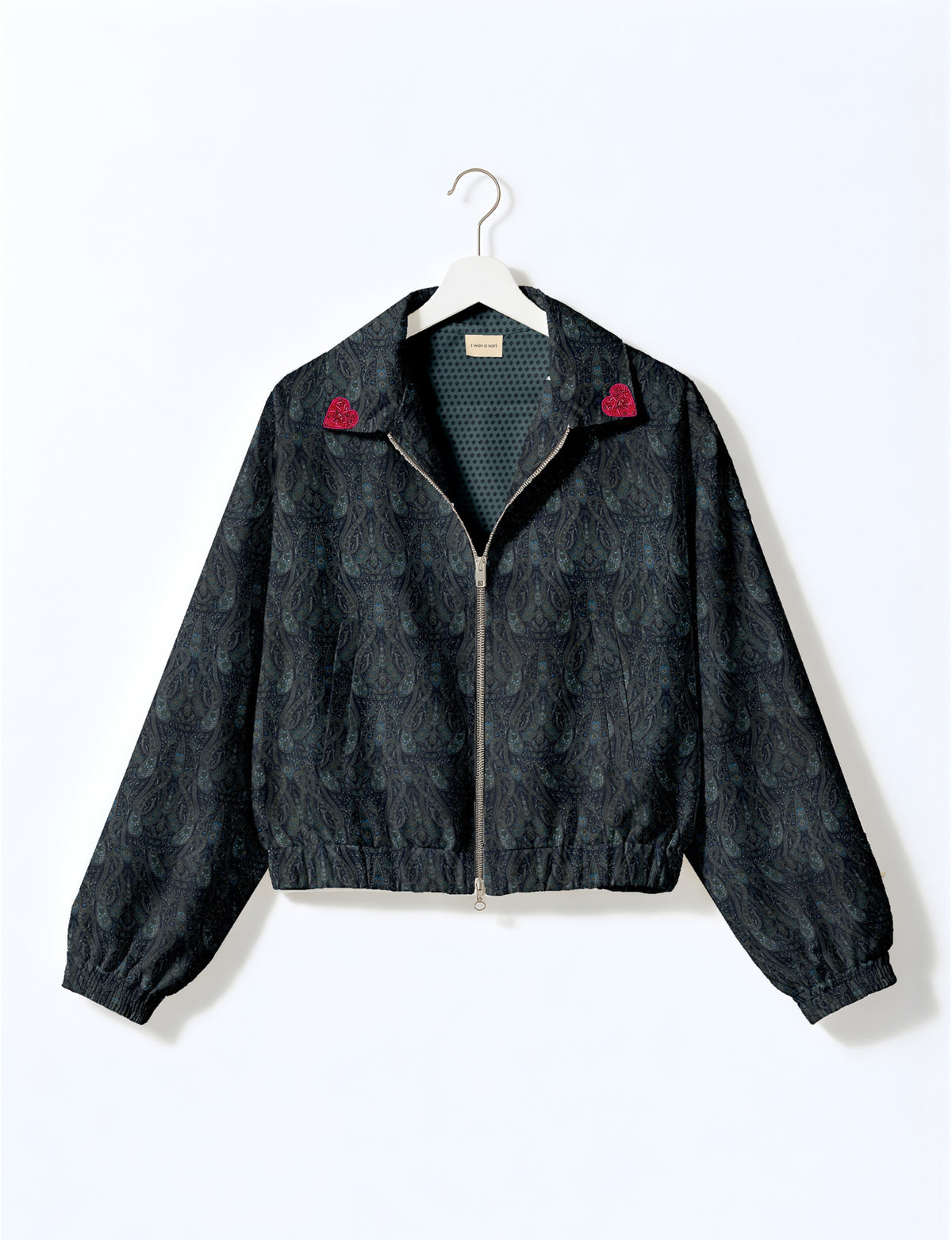 Love Bomber Jacket made from recycled fabric, featuring hand-stitched Aari embroidery. A unique piece of zero-waste clothing, part of the circular fashion movement. Designed with upcycled materials for a stylish yet environmentally friendly clothing choice.