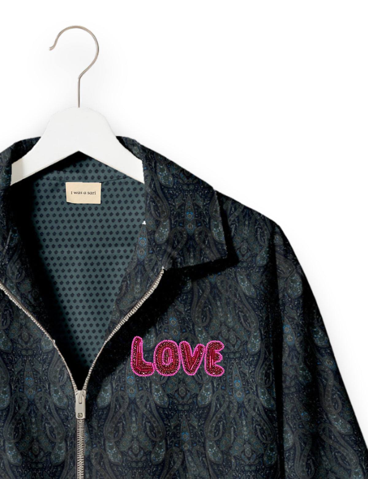 Love Bomber Jacket made from recycled fabric, featuring hand-stitched Aari embroidery. A unique piece of zero-waste clothing, part of the circular fashion movement. Designed with upcycled materials for a stylish yet environmentally friendly clothing choice.